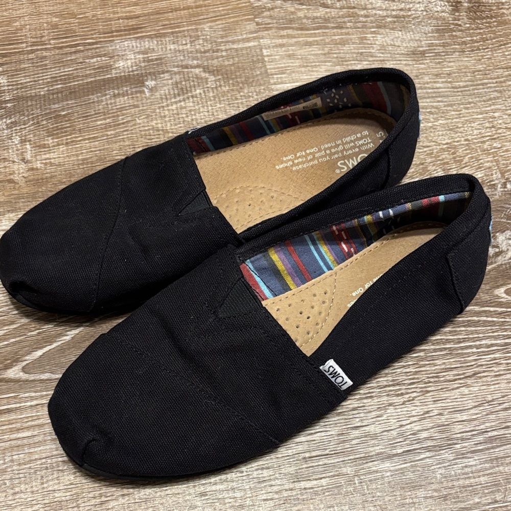 Toms Black Canvas Slip-Ons